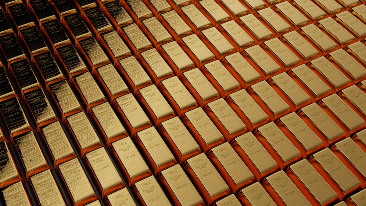 Large stack of gold bars — Gold IRA and physical gold investing