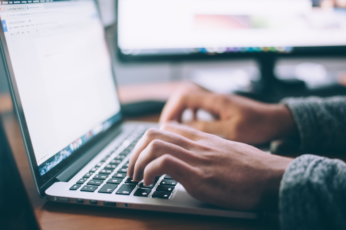 Buildium rental property management software on laptop screen