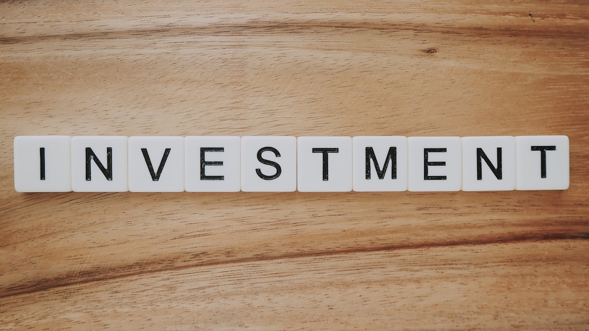 dividend reinvestment DRIP compounding growth chart with stacked coins