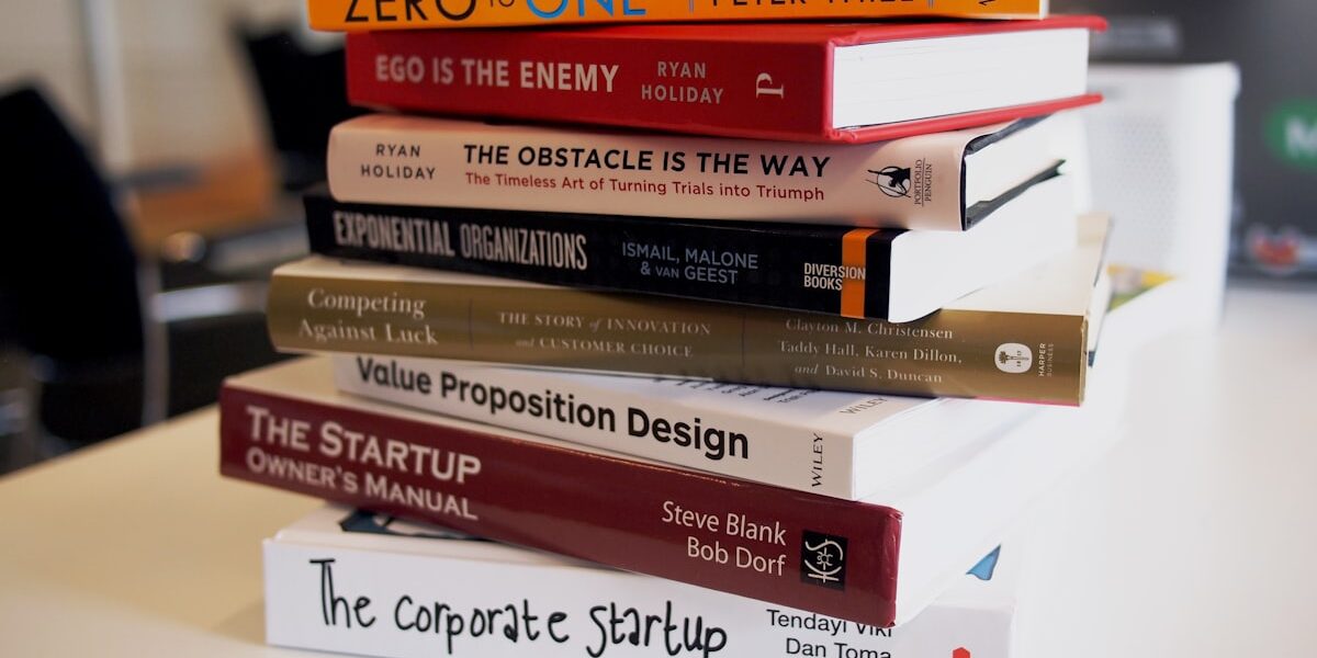 Stack of best books on making money in 2026