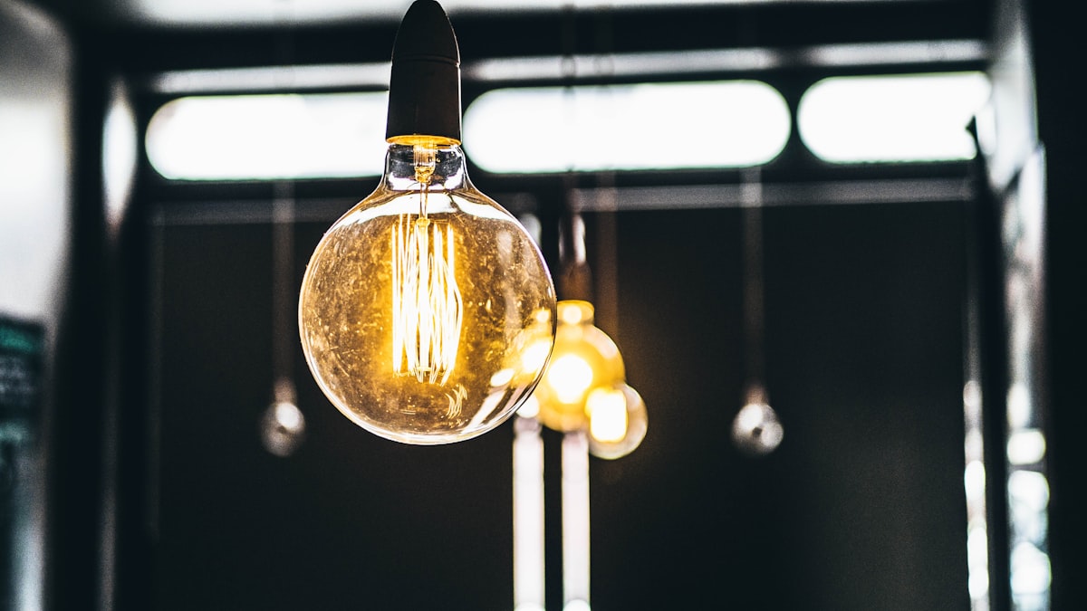 A vintage Edison-style light bulb, a reminder that GE Vernova traces back to the original electrification boom