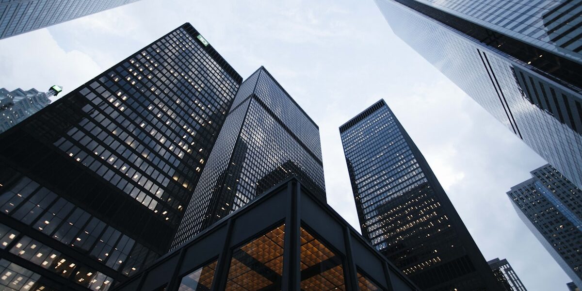 skyscrapers representing how to invest in REITs