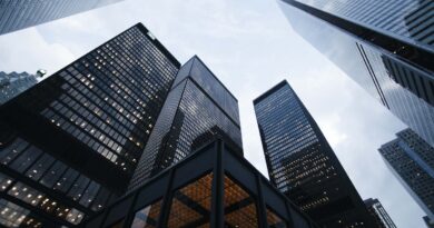 skyscrapers representing how to invest in REITs